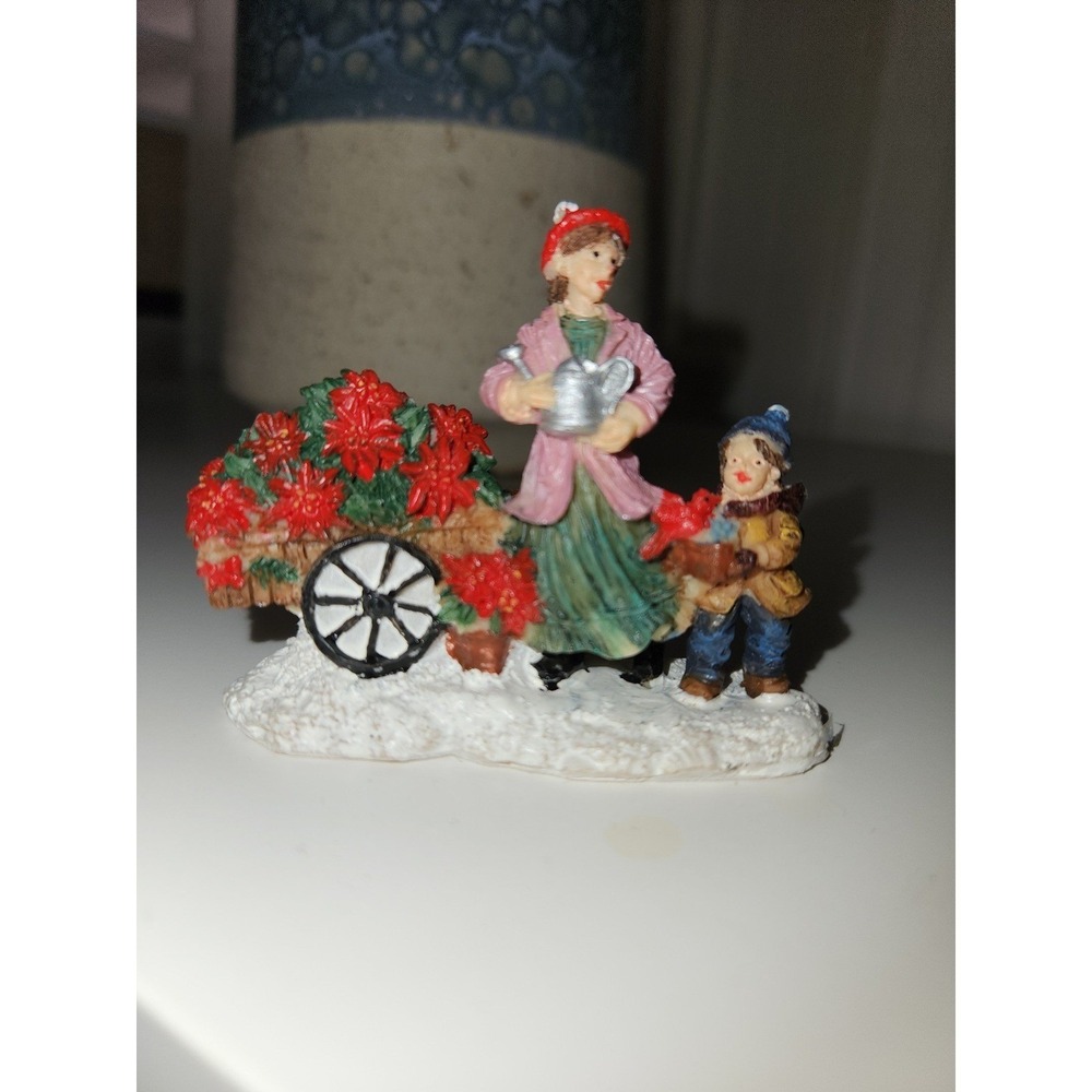 Village christmas decor woman and child vintage